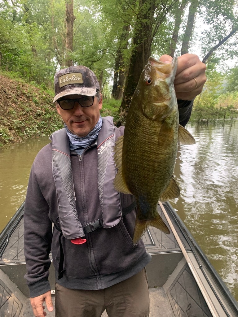 Angler with smallmouth bass on the Upper Potomac River