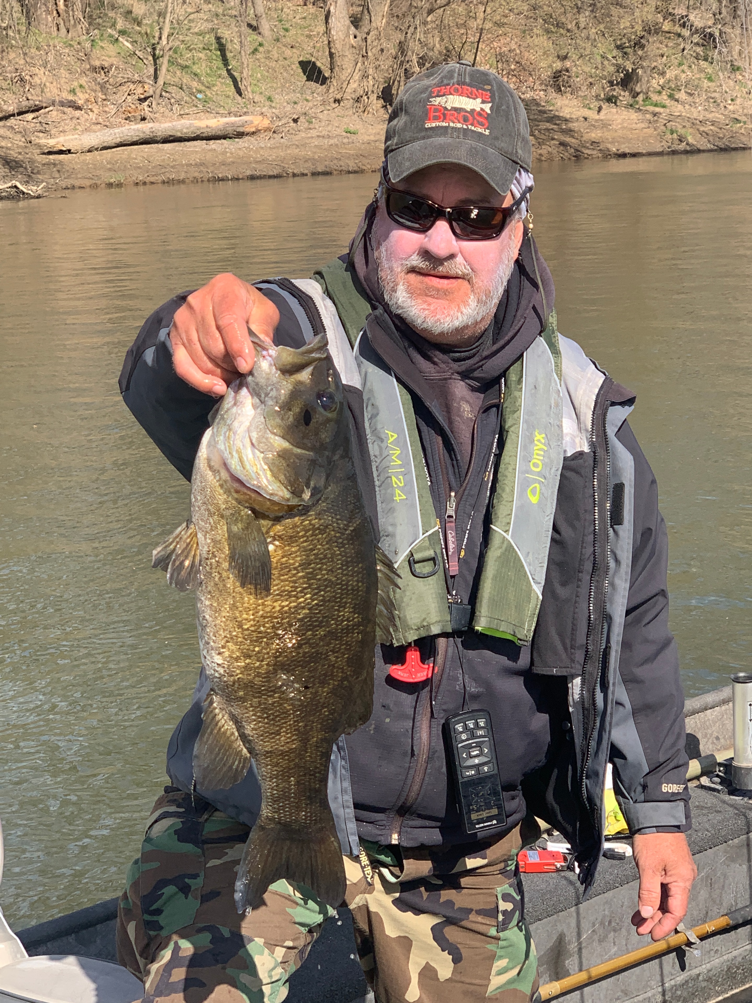 Jeff Greene with a big smallmouth bass on the river